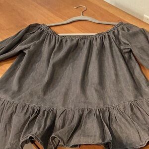 Ruffled top. Dark gray. Size M. Charming Charlie’s